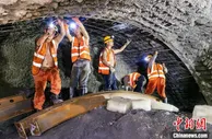 中老铁路最后一座隧道贯通纪实：基建狂魔亮出“科技剑”