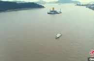 中国首创海上风电筒型基础专用浮运平台顺利出港