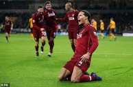 足球赛报：英超-萨拉赫传射范队破门 利物浦2-0夺圣诞冠军