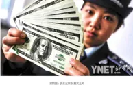 玩球网报：女子买9100元冥币当美元存入银行 通过ATM提现