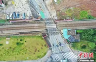 63岁铁路道口“光荣退休” 告别城市“人铁共行”记忆