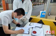 浙江义乌货运稳 公路港日均进出车辆约2.6万辆
