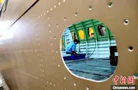 航空工业沈飞国际第100架A220飞机中机身段下架