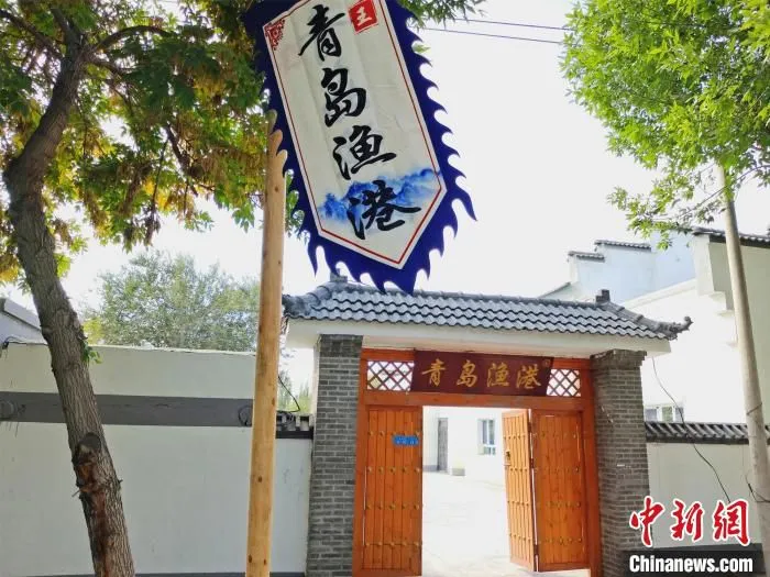 村里统一齐整的徽派建筑。　史玉江 摄