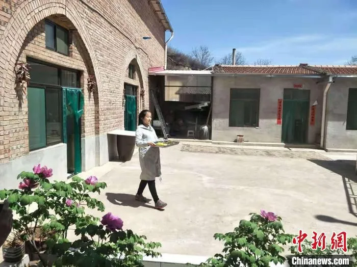 屯留旅游公路沿线风光吸引了不少游客“打卡”，也给当地乡村旅游提供了支撑。　李红卫 摄