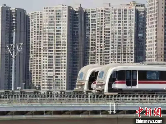 图为不载客试运行瞬间。　重庆市住房和城乡建设委员会供图