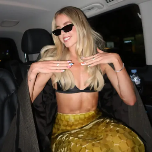 HEAD OVER KEELS: Keely Hodgkinson Stuns in See-Through Outfit, Shows Off Impressive Abs