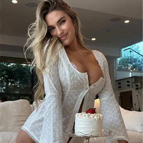 SIM CITY World’s sexiest volleyball star Kayla Simmons risks wardrobe malfunction in daring gown at wedding