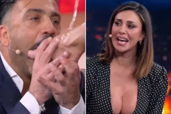 Footballer's model ex-girlfriend lets TV host drink off her foot as video sparks outrage