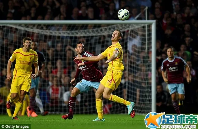 Jordan Henderson comes under pressure from West Ham's Morgan Amalfitano