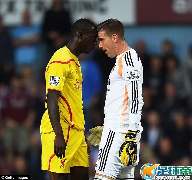 Mario Balotelli squares up to West Ham goalkeeper Adrian following a heavy challenge