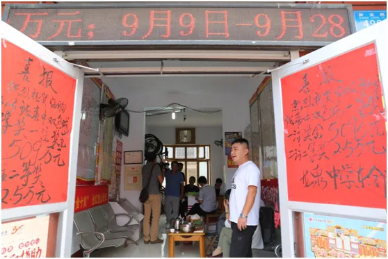 得知亲手打出509万中奖票 手哆嗦得拿不住手机