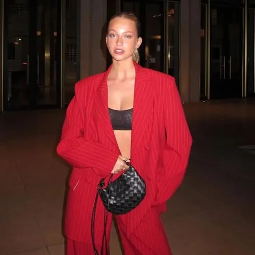 NOR LIKE IT Lando Norris’ stunning Wag Magui Corceiro flashes bra in elegant red outfit as she celebrates 23rd birthday