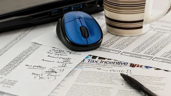 The expected tax revenue from the UK betting tax increase is halved, and the black market may double.