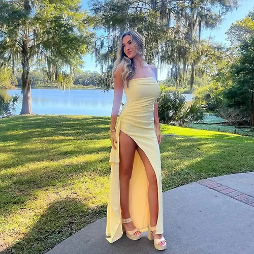 SIM CITY World’s sexiest volleyball star Kayla Simmons risks wardrobe malfunction in daring gown at wedding