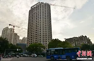 中国下调房贷利率下限 楼市信心有望提升