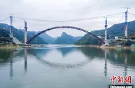 在建世界最大跨径拱桥——天峨龙滩特大桥主桥拱桁实现合龙