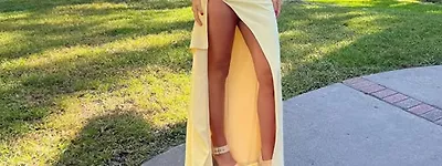 SIM CITY World’s sexiest volleyball star Kayla Simmons risks wardrobe malfunction in daring gown at wedding